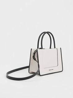 Cream Mini Daylla Tote Bag | CHARLES & KEITH Shopping Box Bag With Detachable Handle, Medium Box Bag With Detachable Handle For Shopping, White Tote Box Bag With Top Carry Handle, Modern Everyday Recyclable Bags, Modern Recyclable Bags For Everyday Use, Eco-friendly Shoulder Bag With Detachable Double Handle, Modern Recyclable Tote Bag, Modern White Box Bag For Daily Use, White Double Handle Box Bag For Shopping