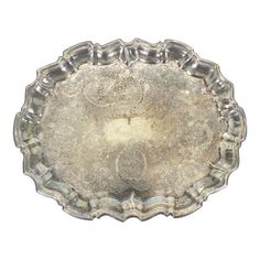 an antique silver plate on a white background