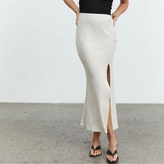 Retold Bias Midi Skirt In Natural Crafted From A Soft And Breathable Linen Fabric: 30% Linen 70% Rayon - Lightweight Linen Blend - Non-Stretch - Unlined - Form-Fitting - Invisible Zip Entry To Side Seam - Side Split Beige Midi Bottoms For Day Out, Casual Skirt With Side Slits, Chic Long Skirt For Brunch, Spring Pencil Skirt With Side Slits, Long Skirt For Brunch, Casual Skirt Bottoms With Side Slits, Asymmetrical Skirt For Day Out In Beige, Spring Skirt Bottoms With Side Slits, Beige Midi Skirt For Brunch