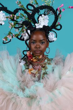 A portrait of a young Black girl in dense ruffles, her hair styled into twists and turns with floral motifs stemming from each shape. Flowers In Her Hair, Funky Hairstyles, Afro Art