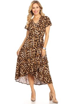 This Leopard Dress is our favorite made with a blend and soft fabric. This is a cute and comfy midi dress featuring a wrap waist tie and a flattering yet modest v-neckline! Versatile and easy to wear this dress will add a pop of print to your wardrobe. Approx. 44" length V-neckline95% Rayon 5% SpandexShort SleevesMade in USA Small: Bust: 34". Waist: 26-26.5". Medium: Bust: 36" Waist: "28-28.5 .Large: Bust: 38" Waist: 30-30.5". XL: Bust: 43-44" Waist: 33-34" .2Xl: Bust: 46-47" Waist: 36-37".3Xl: Leopard Dress, Plus Dresses, Large Bust, Wholesale Clothing, Small Bust, Xl Dress, Waist Tie, High Low Dress, Soft Fabric