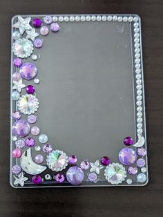 a mirror that has some jewels on it