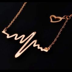 This Is A Brand New Ekg Heart Beat Necklace, Adorned With A Lovely Cute Dangling Open Heart. This Necklace Measures At 15" In Length Plus An Additional 1.96" In Adjustability. The Pendant Is 3.5cm In Width And 2.5cm In Height. This Is Available In 3 Different Ways, 14k Rose Gold Plated, 14k Gold Plated And Silver Plated Heart-shaped Rose Gold Charm Necklace, Rose Gold Metal Heart Necklace For Mother's Day, Trendy Rose Gold Heart Necklace, Trendy Rose Gold Charm Necklaces For Valentine's Day, Heart-shaped Rose Gold Metal Necklace, Rose Gold Metal Heart Necklace, Rose Gold Heart-shaped Metal Necklace, Trendy Rose Gold Heart Charm Necklaces, Rose Gold Heart Necklace In Stainless Steel