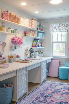 a home office with lots of crafting supplies on the desk and shelves above it