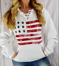 "American Flag Sweatshirt, 4th of July Sweatshirt, Lace Up Hoodie, USA Sweatshirt, American Flag Top, Sports Hoodie, Patriotic Clothing Perfect for cool summer and fall nights, bonfires on the beach, on the boat, tailgaiting or simply year round! Best. Hoodie. Ever. Simple. Classy. Versatile. American. Super warm. Super soft. www.etsy.com/shop/RainDancerClothing These are men's/unisex sizes. So grab one for your hubby, boyfriend, brother, father, and uncle too! LADIES, because these are men's si American Flag Sweatshirt, American Flag Design, Usa Sweatshirt, White Top Women, Loose Hoodie, Patriotic Outfit, American Flag Print, Usa Outfit, Pocket Hoodie