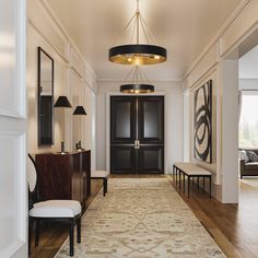 the hallway is clean and ready for guests to use it as an entrance way in this house