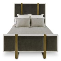 an upholstered bed with two wooden legs and pillows on the headboard, against a white background