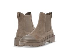 Steve Madden Mayslie - Women's Boots : Taupe Suede : Formed with a leather and synthetic upper with a contrasting cap toe and an easy pull-on style with stretch gores, the Steve Madden Mayslie Boots are perfect for the minimalist fashion lover who does not want to skip comfort. Boasting the classic Chelsea boot silhouette with upgraded modern design elements, the ankle-high shoes are elevated by a lug sole with a block heel. Textile and synthetic lining. Synthetic insole. Synthetic rubber outsol Taupe Leather Boots, Medium Width, Taupe Leather Boots Medium Width, Fall Suede Cap Toe Boots, Leather Boots With Rubber Toe Cap For Fall, Fall Leather Boots With Rubber Toe Cap, Taupe Leather Boots For Fall, Taupe Leather Boots With Round Toe, Winter Taupe Leather Boots, Taupe Leather Boots For Winter