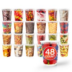 a group of plastic cups filled with lots of different types of candies and candy