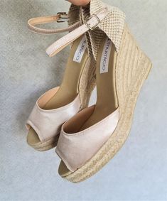 "Peep toe, ankle strap, rope sole espadrille wedges (7cm heels = 2.76 inches) in BEIGE SATIN plus a platform (2cm = 0.79i). Aprox height between 9 and 10cm (3.54i). Antislippery soles covered with rubber. Ankle strap with a buckle. 🌿 Eco friendly. Jute fiber has excellent insulating properties and low thermal conductivity. It is environmentally friendly, bio-degradable and recyclable. ♻ SUSTAINABLE PACKAGING, we try to avoid all plastic materials. Discover our complete collection at WWW.MUMICOE Open Toe Espadrille Wedge Sandals, Open Toe Espadrille Wedge Sandals With Wrapped Heel, Espadrille Wedge Sandals With Wrapped Heel And Open Toe, Open Toe Heels With Heel Strap In Espadrille, Espadrille Heels With Heel Strap And Open Toe, Chic Beige Open Toe Espadrilles, Open Toe Espadrilles With Wrapped Heel, Chic Open Toe Espadrille Heels, Adjustable High Heel Platform Espadrilles