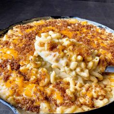 a skillet filled with macaroni and cheese