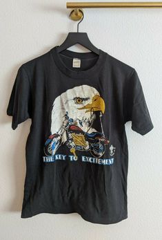 Vintage 1984 Harley Davidson EAGLE Graphic T-Shirt Size Medium Made in USA. No holes, snags, stains Approximate measurements Underarm to underarm 18.5 in Length 24.5 in Harley Davidson Eagle, Vintage Harley Davidson Shirt, Harley Shirts, Eagle Graphic, Style Bundle, Harley Davidson Tee, Future Wardrobe, Eagle Shirts, Harley Davidson T Shirts