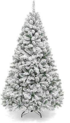 a white christmas tree with snow on it