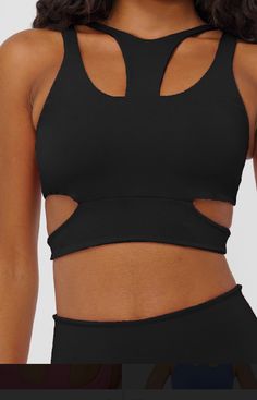 Monochrome cropped cut out in a surprising design to modernize your look. Its barred does not tighten the waist when wearing. Made of opaque and full-bodied fabric, it contains removable bulge and offers 50+ UV protection. Combine with your favorite leggings or shorts for a complete cutest look. Black Seamless Cropped Crop Top, Cropped Seamless Sports Bra, Black High Stretch Crop Top Sports Bra, Black Cropped Activewear With Built-in Bra, Black Compressive Crop Top Activewear, Black Sculpting Seamless Sports Bra, Black Supportive Cropped Top, Black Seamless Crop Top Activewear, Black Cropped Sports Bra With Seamless Construction