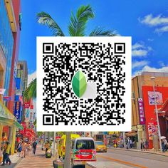 a qr - code is shown on the side of a city street