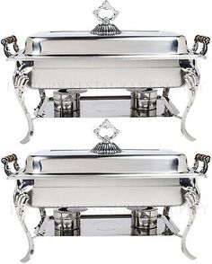 three silver trays with handles on each side