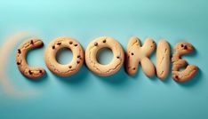 the word cookie spelled out in cookies on a blue background