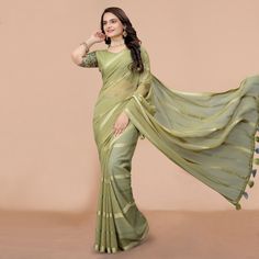 Green colored saree is made from georgette fabric which is highlighted with beautiful zari woven striped pattern as shown. comes along with unstitched sequins embroidered net blouse which you can customise as per your design/style. Occasion - You can wear this saree for festive, functions and get-together. Note:- the actual product may differ slightly in color and design from the one illustrated in the images when compared with computer or mobile screen. Measurements: Saree : Georgette : 5.5 Mtr Saree Georgette, Net Blouse, Net Blouses, Mobile Screen, Silk Lehenga, Georgette Saree, Georgette Fabric, Georgette Sarees, Design Style