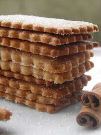 a stack of cookies sitting on top of a white table