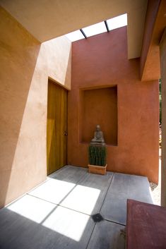 Front porch of modern adobe home with custom architecture design & skylights in Mandeville Canyon Brentwood Los Angeles. Colored Walls, Sliding Wall