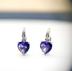 Sweet heart earrings! Deep purple amethyst heart shaped Cubic Zirconia gemstone! 3 prong setting 5mmx6mm size Drop length 15mm February birthstone Perfect gift for someone you love!  Thanks for looking make sure to check out my store for other unique gift ideas! https://www.etsy.com/ca/shop/PersonalizedByLD Lisa Petite Jewelry, Amethyst Heart, Heart Drop Earrings, February Birthstone, Sweet Heart, February Birth Stone, Favorite Rings, Purple Amethyst, Heart Earrings