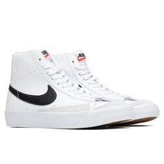 The beloved Blazer Mid ‘77 is given an all-white leather base with a black Swoosh, providing a monochromatic design. The clean design is complemented by matching white cotton laces and a rubber outsole. Suede detailings surround the shoe’s base contributing to its durability. Foam cushioning is utilized throughout the insoles for ultimate comfort. Leather upper Rubber outsole Cotton laces Grade School sizing Style No: DA4086-100 Nike Highcut, Nike Blazers Cheap, Nike Blazera, Nike Blazers Black And White, Nike White High-top Skate Shoes, Nike Blazers All White, Nike Blazers, Ella Shoes, Girls Shoes Teenage