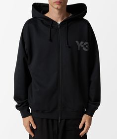 Founded in 2002, adidas Y-3 is the collaborative brainchild of renowned fashion designer Yohji Yamamoto and sporting giant adidas. Embodying the fusion of high-end fashion and sportswear, the brand continues to push boundaries with its innovative designs.Introducing the adidas Y-3 Logo Zip Hoodie for Fall/Winter 2024. Embrace the sleek black colorway and minimalist logo detailing on this iconic piece. Perfect for those looking to elevate their streetwear game with a touch of sophistication. Stay 3 Logo, Comme Des Garcons Play, Fall Winter 2024, Streetwear Style, Bank Card, Yohji Yamamoto, Minimalist Logo, Winter 2024, High End Fashion