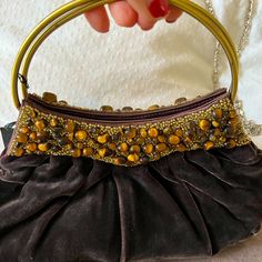 Beautiful Brown Velvet Handheld Bag With Beaded And Gold Ring Handles. Beautiful Beading And Plush, Luxurious Feel. Never Used, Still Has Tags On. Can Be Dressed Up For Evening Or Dressed Down For Dinner Out. Brown Embellished Evening Bag, Embellished Brown Shoulder Bag For Party, Brown Embellished Shoulder Bag For Party, Party Brown Embellished Shoulder Bag, Embellished Brown Evening Bag, Beaded Brown Evening Bag For Party, Embellished Brown Evening Bag For Party, Elegant Embellished Brown Shoulder Bag, Elegant Embellished Brown Bag