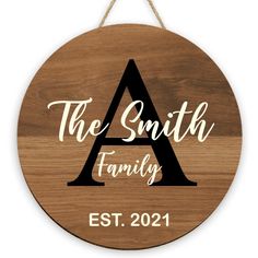 a wooden sign that says the smith family