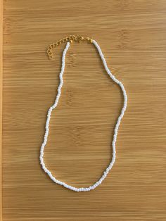 white seed bead necklace. age size, 9yrs - 24yrs. waterproof beaded necklace handmade with love by Addi. White Strand Jewelry As Gift, White Strand Jewelry Gift, Everyday White Single Strand Necklace, White Single Strand Beaded Bracelet For Gift, White Beaded Chain Necklace For Everyday, White Necklaces With Tiny Beads For Everyday, Everyday White Single Strand Beaded Necklace, White Summer Jewelry For Everyday, Summer White Beaded Bracelets With Letter Beads