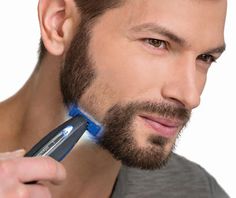 Maintain your look with one easy tool using the MicroTouch Solo smart razor. Built with dual-sided German stainless steel blades for up and down movement, the razor allows you to trim, edge and shave all at once. Designed with a pivoting head to contour to your face, this amazing razor is perfect for beards, mustaches, sideburns and even body hair. Beard Straightening, Beard Trimmer, Electric Razor, Body Hair Removal, As Seen On Tv, Unwanted Hair Removal, Beauty Advice, Beard Trimming, Unwanted Hair