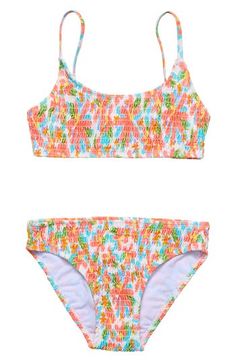 This beach-ready two-piece swimsuit pairs a quick-drying smocked top with matching full-coverage bottoms printed with a burst of vibrant blooms. Adjustable straps UPF 50+ sun protection Quick-drying Lined, with removable soft cups in sizes 14 and 16 85% REPREVE® recycled nylon, 15% elastane REPREVE recycled nylon is made from 100% post-industrial recycled waste Machine wash, line dry Imported Kids Luau, Preppy Swimsuit, Pretty Swimsuits, Cute Bathing Suits, Compostable Packaging, Hawaiian Luau, Summer Swim Suits, Cute Swimsuits, Matches Fashion