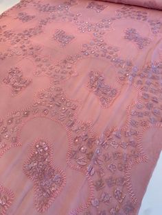 Look at the beautiful detail and texture on this dusty pink embroidered and stitched silk chiffon designer fashion fabric with sequins. SKU: 8331 Content: 100% Silk with Polyester Applique Color: Dusty Pink Width: 42 inches Elegant Semi-stitched Pink Embroidered Fabric, Elegant Pink Semi-stitched Embroidered Fabric, Elegant Pink Unstitched Embroidered Fabric, Pink Unstitched Dupatta With Sequins, Pink Silk Embroidered Fabric For Eid, Pink Semi-stitched Silk Embroidered Fabric, Semi-stitched Pink Silk Embroidered Fabric, Pink Intricate Embroidery Unstitched Fabric, Pink Embroidered Fabric For Party