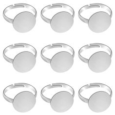 six pairs of stainless steel rings on white background