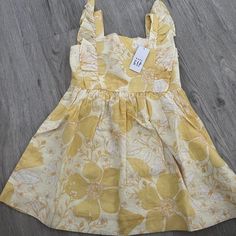 Cute For Spring Or Summer! Gap Baby Apron Dress Yellow Flower Print Flutter Sleeve Zip Side Lined Size 3y Cute Floral Print Sundress For Dress-up, Spring Floral Print Sundress For Playdate, Summer Floral Print Dress For Playdate, Spring Floral Sundress For Playdate, Spring Sundress With Ruffles For Playdate, Gap Cotton Dresses For Spring, Beach Floral Sundress For Babies, Beach Sundress With Floral Print For Babies, Gap Cotton Mini Length Dress