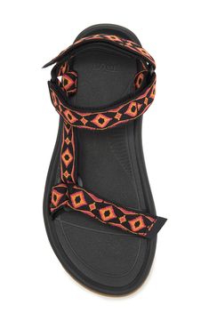 Adjustable hook-and-loop straps mean a custom fit in a water-ready sandal featuring a shock pad and padded heel for additional cushioning. Adjustable straps with hook-and-loop closure Cushioned footbed Textile upper/ textile and synthetic lining and sole Imported Men's Shoes Black Sandals With Buckle Closure For Outdoor Activities, Adjustable Strap Black Sport Sandals, Adjustable Ankle Strap Sport Sandals For Outdoor, Outdoor Sport Sandals With Ankle Strap And Buckle Closure, Black Sport Sandals With Adjustable Strap For Outdoor Activities, Black Sport Sandals With Adjustable Strap For Outdoor, Black Sport Sandals With Adjustable Double Straps, Synthetic Sport Sandals With Strap For Outdoor Activities, Open Toe Sport Sandals With Strap For Outdoor Activities