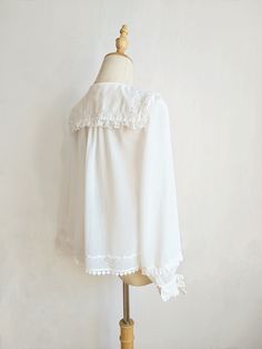 Features: It features ruffled pointed collar, long sleeves, two bowknots on the cuffs, five buttons on&nbsp; the neckline, heart-shaped hem.Attention: This price includes a blouse only, others are not included.&nbsp;Size Chart:Size (CM): Unit CM; Sizes below are measured in flat-laid position, hand measurement will have discrepancy of about 2 CM.Size(cm)XSSMLXLXXLShoulders353637383940Bust8286909498102Sleeve Length565658586060Shirt Length555557575959 Long Sleeve Tops With Detachable Collar For Daywear, Classic Long Sleeve Blouse With Bow, Fitted Long Sleeve Top With Detachable Collar, Elegant Long Sleeve Blouse With Detachable Collar, Chic Blouse With Ruffles And Cute Collar, White Doll Collar Blouse With Detachable Collar, Feminine Blouse With Lace Cuffs And Ruffled Collar, Elegant Blouse With Doll Collar, White Long Sleeve Blouse With Bow