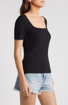 Solid and stretchy, this ribbed top will achieve staple status as you wear it year-round. 23 1/2" length (size Medium) Scoop neck Short sleeves 55% cotton, 40% modal, 5% spandex Machine wash, dry flat Imported Fitted Ribbed Tops For Spring, Fitted Ribbed Cotton Tops, Fitted Cotton Tops With Ribbing, Fitted Solid Color Tops With Ribbing, Fitted Solid Color Ribbed Tops, Black Ribbed Tops, Fitted Ribbed Elastane Tops, Casual Fitted Ribbed Knit Top, Summer Ribbed Elastane Tops