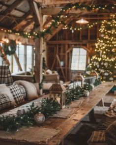 a living room filled with lots of furniture and christmas lights on the wall behind it