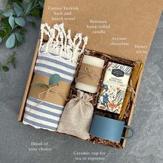 the gift box contains three different types of soaps, coffee cups and tea bags