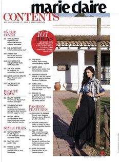 the front page of marie claire's magazine, featuring an image of a woman leaning against a tree