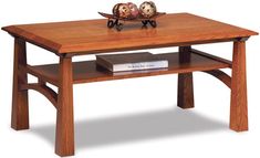 a wooden table with two birds on top and a book shelf underneath the coffee table