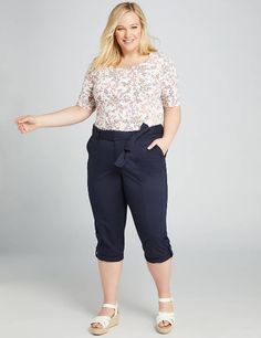 Lane Bryant belted utility poplin pants. New with tags. Take on the day in this utility-inspired pant in the pedal silhouette you love. The lightweight material and roll-tab details at the cuffs make them the perfect weekend outfit staple. Covered elastic waist with flat front. Self-tie belt and loops. Four patch pockets. Roll-tab detail at the cuffs. Button and zip-fly closure. LEG SHAPE: Pedal. Super slim from hip to upper or mid-calf. INSEAM: 19" FABRIC: Poplin blend. Structured yet stretchy Casual Spring Bottoms With Belted Cuffs, Spring Paperbag Waist Bottoms With Cargo Pockets, Spring Cargo Pocket Paperbag Waist Bottoms, Poplin Pants, Four Patch, Sky New, Waist Cincher Corset, Clothing Staples, Midnight Sky