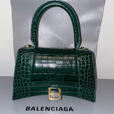 Balenciaga Hourglass Crocodile Embossed In Forrest Green Gently Worn Currently Retailing Online For $2,800 Comes With Dust Bag And Shoulder Strap Shown In Pictures. Has A Mark On The Inside Of Bag. Bags Balenciaga, Balenciaga Bag, Mini Bag, Balenciaga, Dust Bag, Shoulder Strap, Bag Lady, Handbags, Green