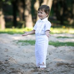 "Baby boy white linen suit includes SET of 4 : - Shirt - Pants - Suspenders - Bow tie Pants come in elastic waist adjustable with buttons. Suspenders are adjustable with buttons on the back and are removable. The bow tie is pre-tied with adjustable Velcro closure on the back. There is possible to order a short or long sleeve shirt, if not specified it will be made short sleeve as seen in the photo. You can order the appropriate size for your baby. Please see the size chart in the last image. It White Sets For First Communion In Summer, White First Communion Sets For Summer, Baby Boy White Outfit, Baby Ring Bearer, Birthday Pants, Baptism Outfits For Boys, Bad Boy Outfits, White Linen Outfit, Bow Tie Pants