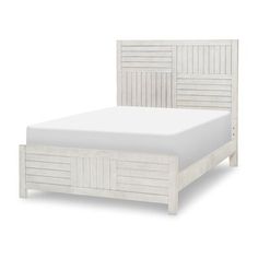 a white bed with wooden headboard and foot board on the bottom side, against a white background