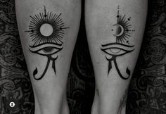 two legs with tattoos on them that have an all seeing eye and moon in the middle