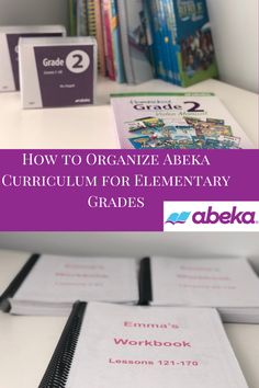 books on a desk with the title how to organize abeka curriculum for elementary grade 2