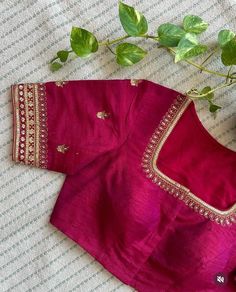 Hand embroidered ready made saree blouse / crop top/stitched saree blouse usa / pink saree blouse/modern blouse/zardosi blouse/red elbow sleeve saree blouse/ pure silk blouse/ maggam work blouse        It is very true that a perfect blouse is the one which makes your saree look stand out !! If you find one of such a style that you have been wanting to have then dont let it go !! we carry such unique trending blouses that instantly add a stylish look to any saree !!     Well..!! we understand that you may not get in your desired size/pattern, here you go with customization according to your size/pattern which we can deliver in 1-2 weeks of time period !!      Here is a beautiful Hand embroidered zardosi work crop top / blouse in pink color that has U neck design emblished with gold hand emb Luxury Embroidered Pink Blouse Piece, Affordable Pink Tops With Custom Embroidery, Luxury Pink Blouse With Intricate Embroidery, Luxury Resham Embroidery Short Sleeve Blouse Piece, Luxury Pink Resham Embroidered Blouse, Luxury Pink Traditional Wear With Unstitched Blouse, Luxury Pink Blouse Piece With Pallu, Luxury Pink Unstitched Blouse, Luxury Pink Blouse With Embroidered Border