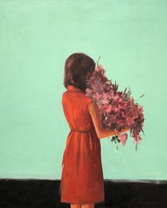 a painting of a girl in an orange dress holding pink and purple flowers, looking at a green wall